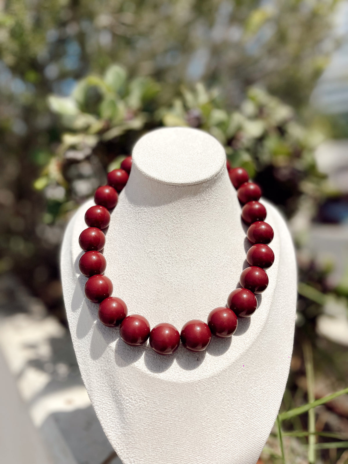 Collar bolas marron