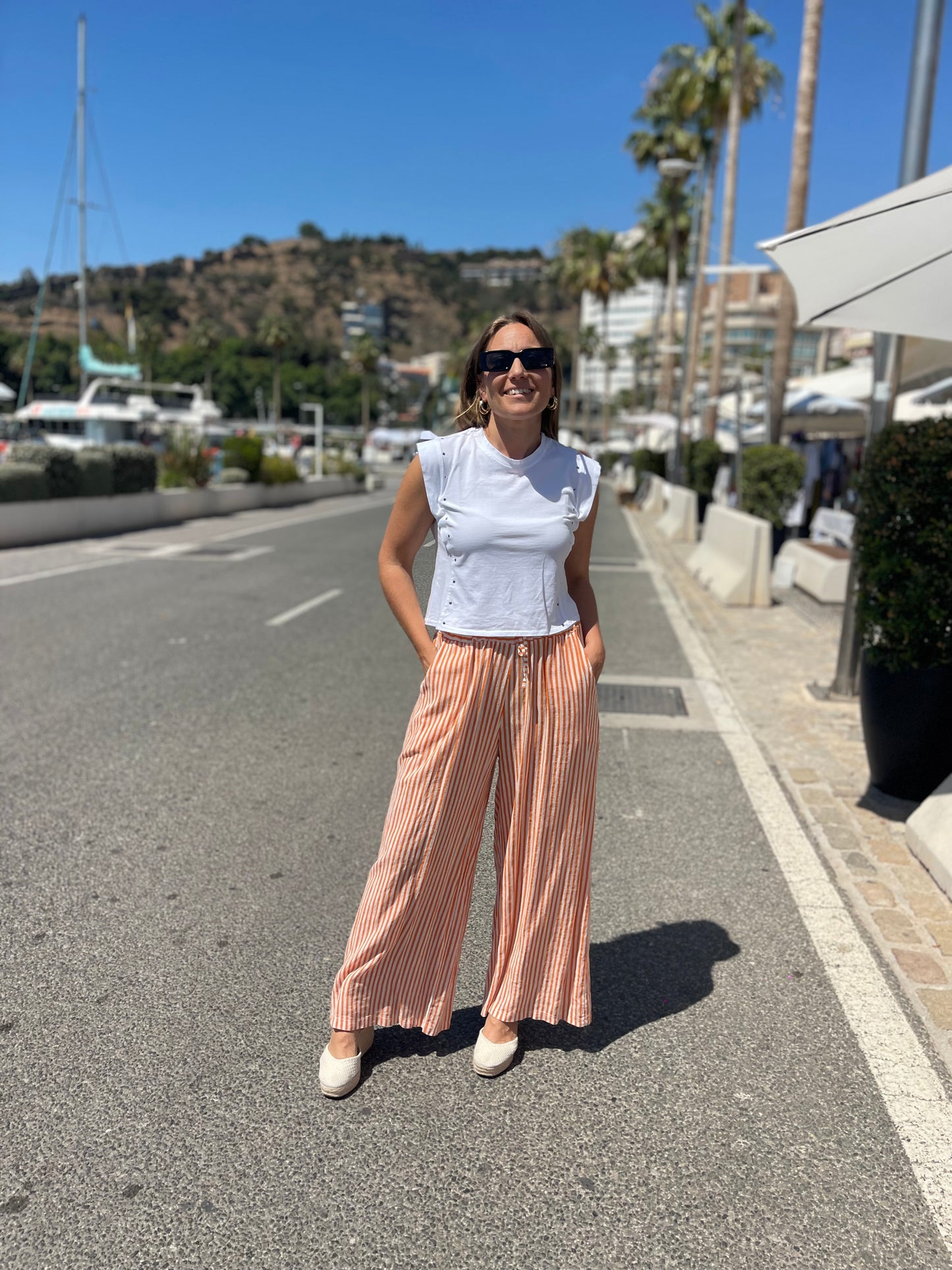 Pantalon rayas fluido naranja