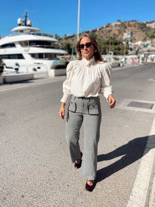 Pantalon Vaquero cuadros con bolsillos ribete animal print