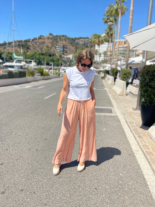 Pantalon rayas fluido naranja
